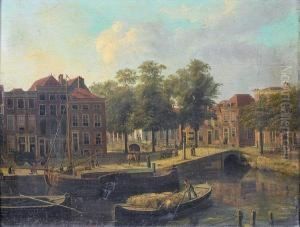 A Dutch Townscape With Barges On A Canal