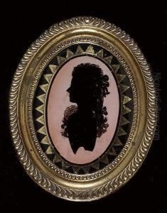 A Silhouette Of A Lady, Profile To The Left, Wearing Dress by Charles Rosenberg