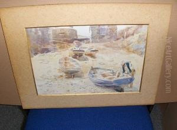 Man Tending Boats In A Rocky Cove - view 1