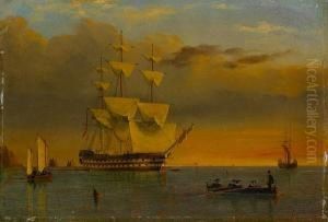 A British '74' Anchored Offshore And Dryingher Sails At Sunset